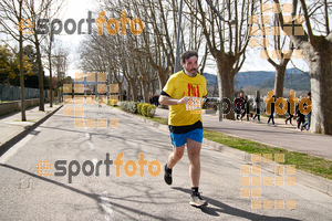 Esportfoto Fotos de 23ena Mitja Marató del Pla de l'Estany 1488736221_396.jpg Foto: Jordi Isasa