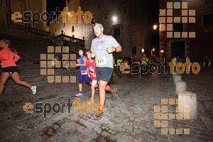 Esportfoto Fotos de La Cocollona night run Girona 2014 - 5 / 10 km 1409496017_18380.jpg Foto: David Fajula