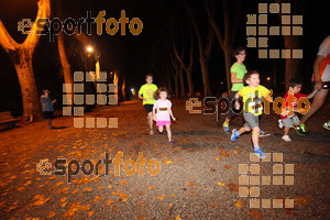 Esportfoto Fotos de La Cocollona night run Girona 2014 - 5 / 10 km 1409508100_17912.jpg Foto: David Fajula
