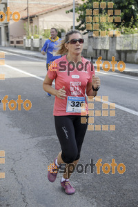 Esportfoto Fotos de XXXI Mitja Marató de Roda de Ter - 2014 1413152241_2974.jpg Foto: Jordi Vila