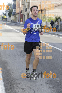 Esportfoto Fotos de XXXI Mitja Marató de Roda de Ter - 2014 1413152293_2997.jpg Foto: Jordi Vila