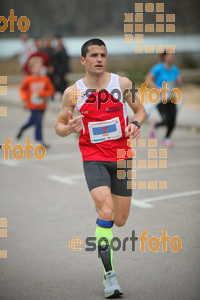 Esportfoto Fotos de 21a Mitja Marató del Pla de l'Estany 1425220213_62.jpg Foto: David Fajula