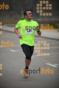 Esportfoto Fotos de 21a Mitja Marató del Pla de l'Estany 1425221157_128.jpg Foto: David Fajula