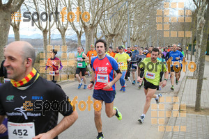Esportfoto Fotos de 21a Mitja Marató del Pla de l'Estany 1425226550_00073.jpg Foto: David Fajula