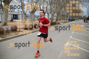 Esportfoto Fotos de 21a Mitja Marató del Pla de l'Estany 1425228347_00119.jpg Foto: David Fajula
