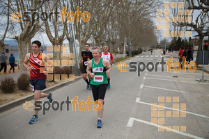 Esportfoto Fotos de 21a Mitja Marató del Pla de l'Estany 1425239096_001102.jpg Foto: David Fajula