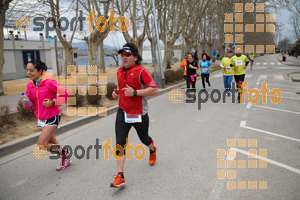 Esportfoto Fotos de 21a Mitja Marató del Pla de l'Estany 1425239230_001512.jpg Foto: David Fajula