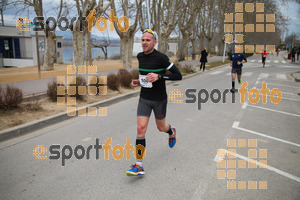 Esportfoto Fotos de 21a Mitja Marató del Pla de l'Estany 1425239394_00190.jpg Foto: David Fajula