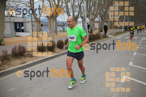 Esportfoto Fotos de 21a Mitja Marató del Pla de l'Estany 1425239555_00261.jpg Foto: David Fajula