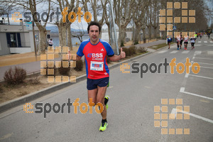 Esportfoto Fotos de 21a Mitja Marató del Pla de l'Estany 1425239597_005045.jpg Foto: David Fajula
